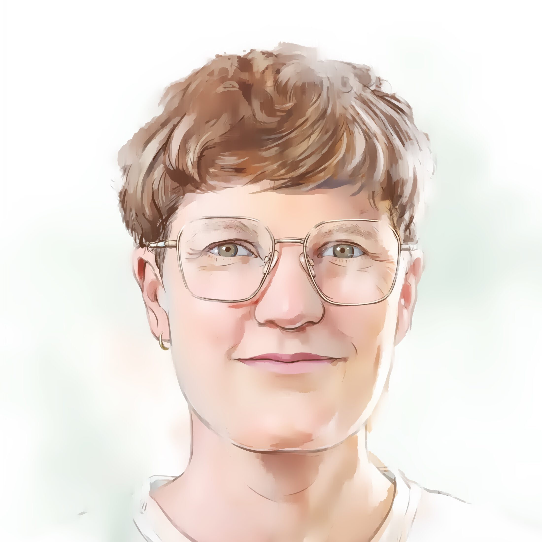 Coach René lächelt leicht in die Kamera. René hat kurze braune Haare und trägt eine Brille.